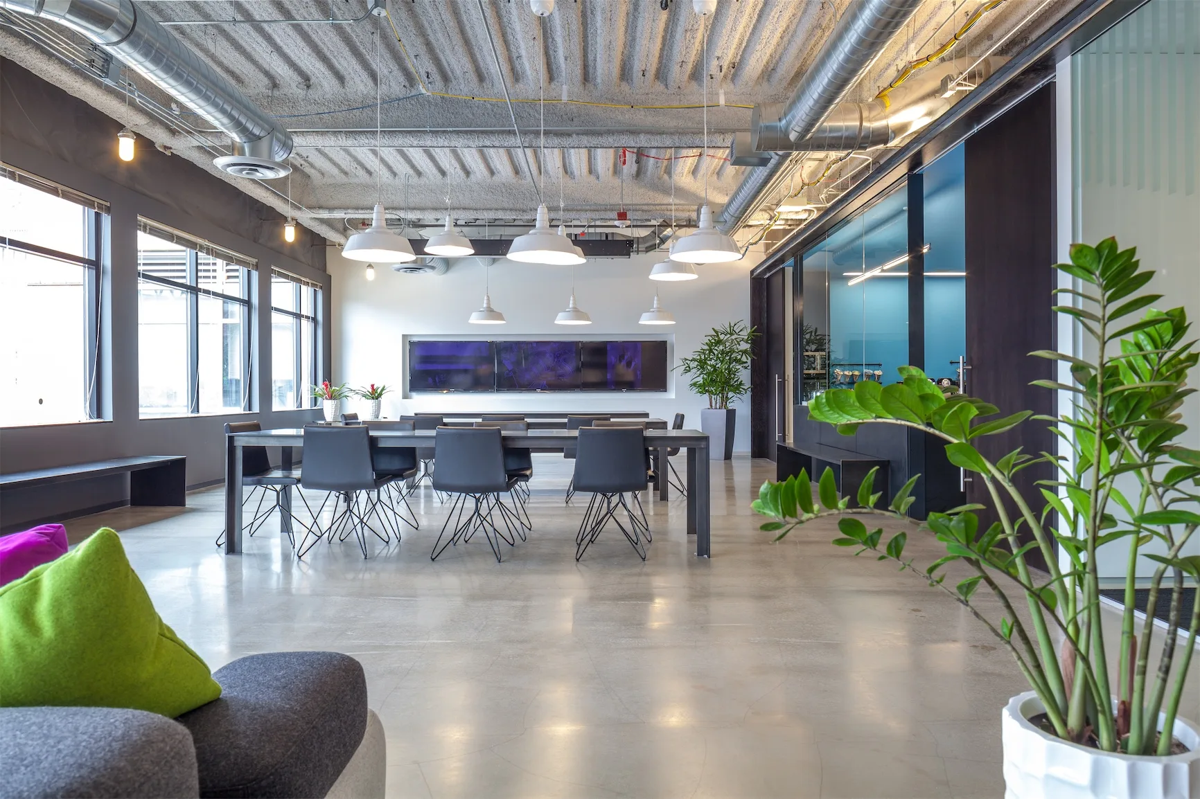 Conference room with long table in a finished commercial space