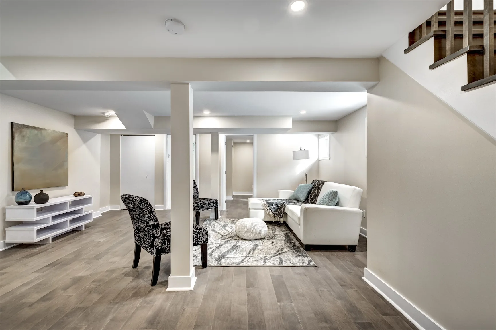 Stylishly furnished finished basement living area